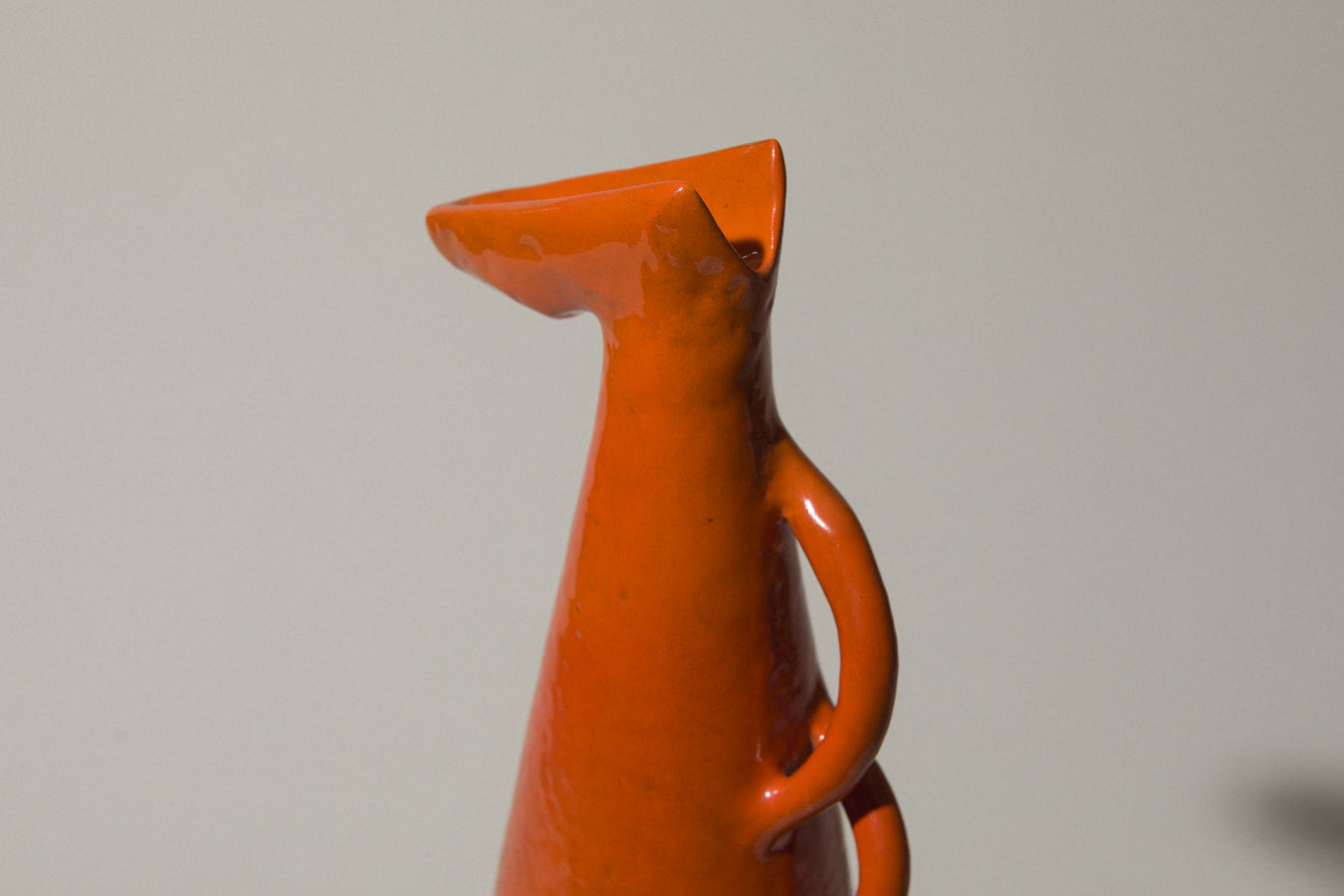 Orange giraffe-shaped VASE by István Gádor