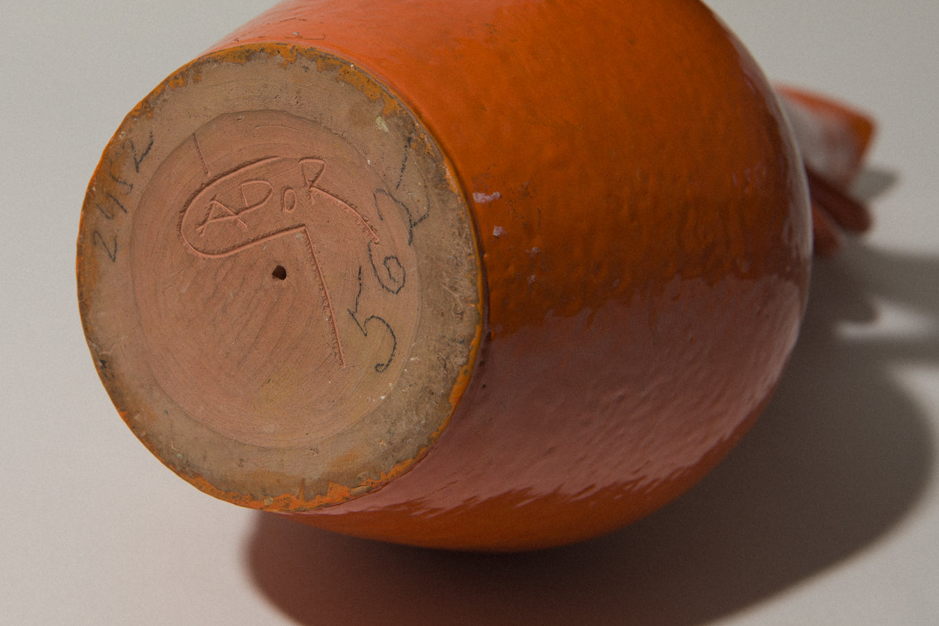 Orange giraffe-shaped VASE by István Gádor