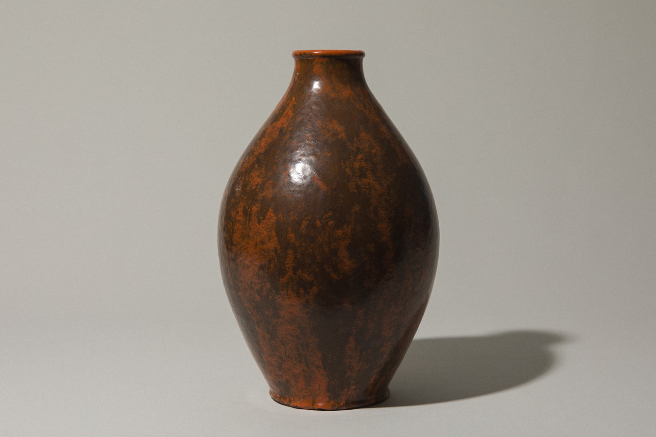 Egg-shaped VASE in dark orange-brown by István Gádor
