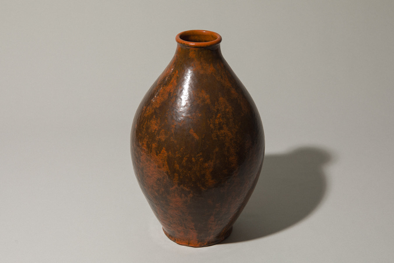 Egg-shaped VASE in dark orange-brown by István Gádor