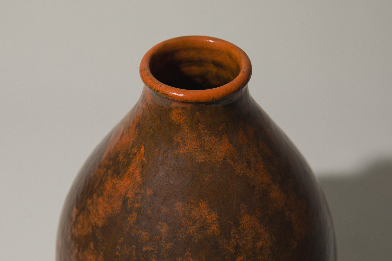 Egg-shaped VASE in dark orange-brown by István Gádor