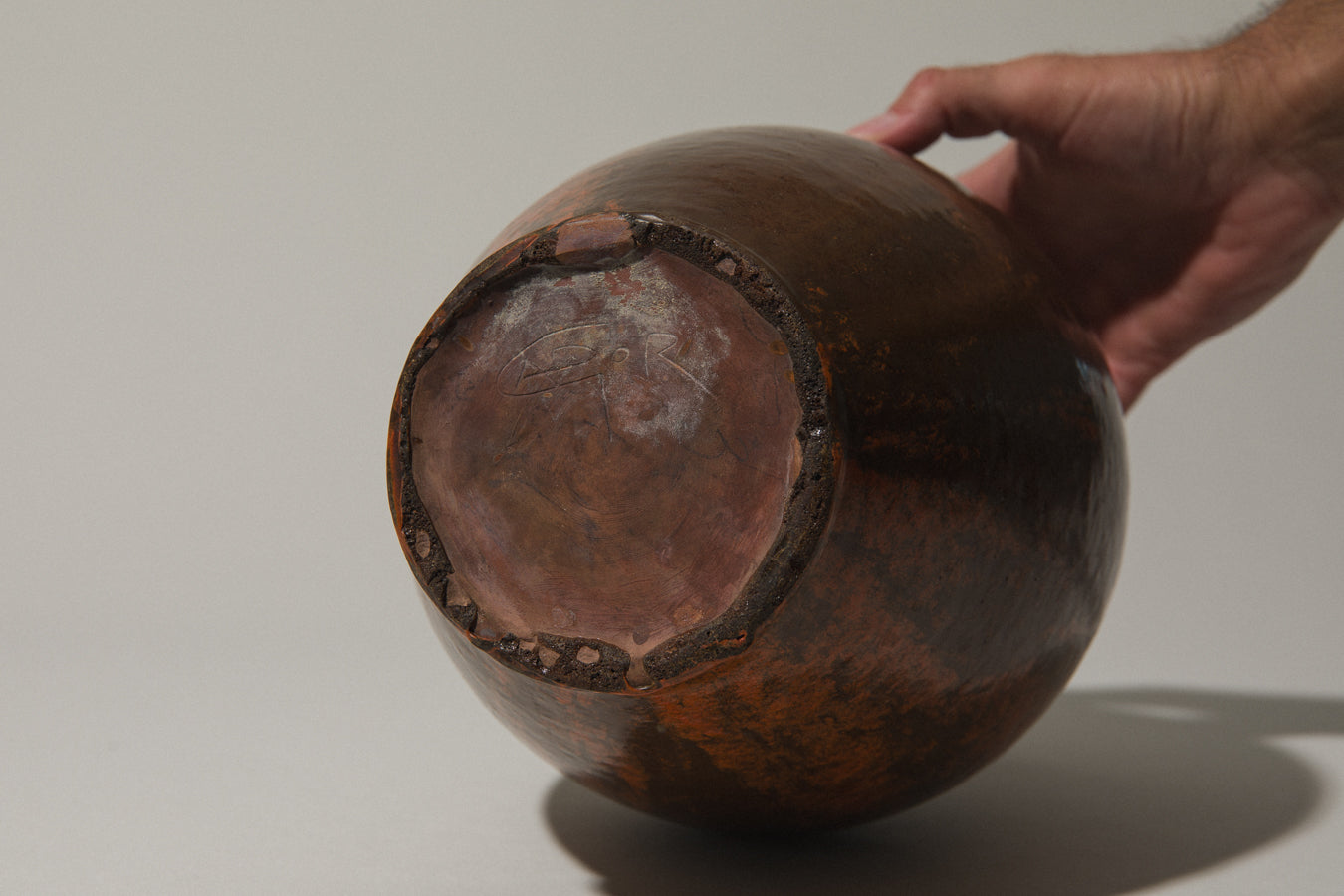 Egg-shaped VASE in dark orange-brown by István Gádor