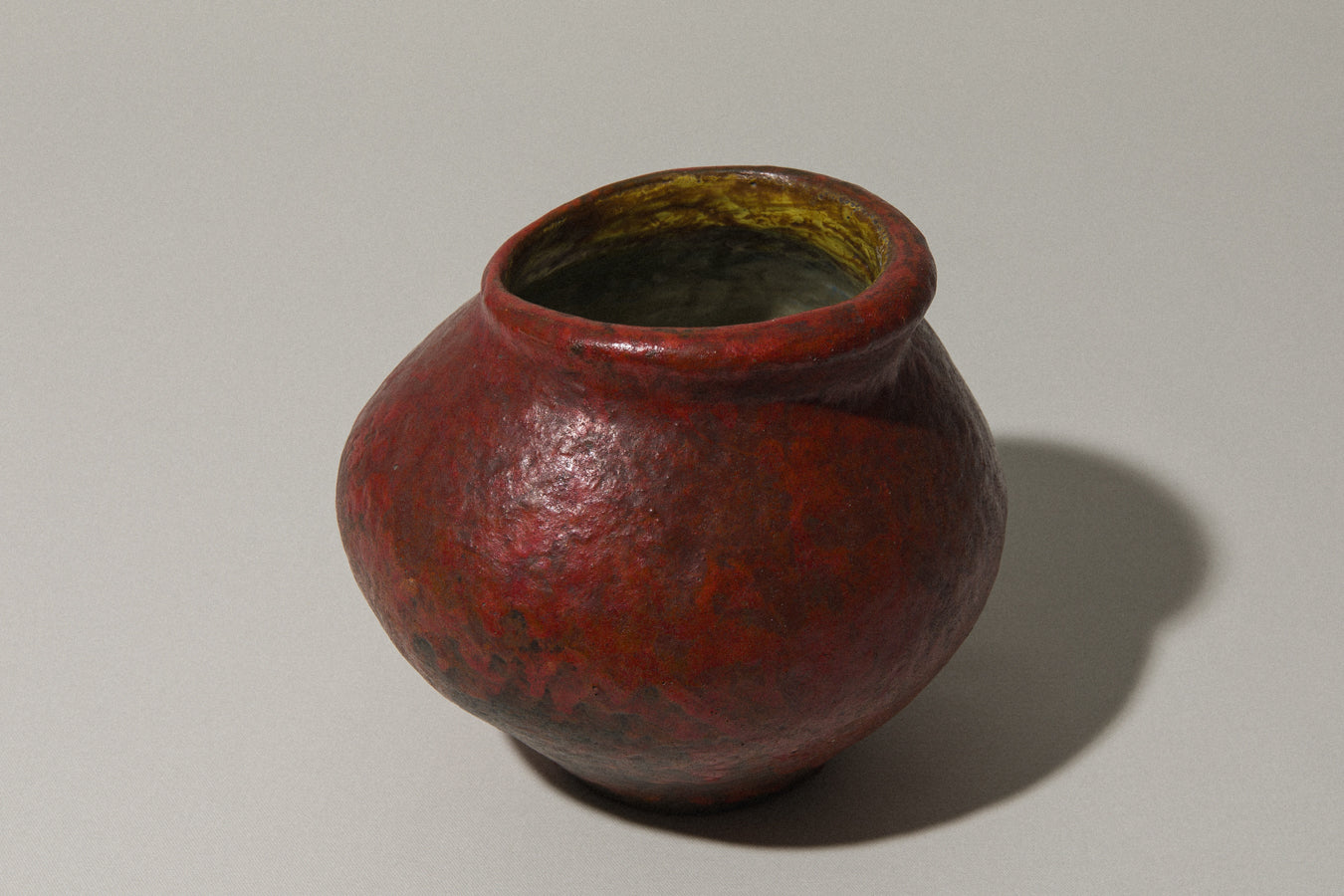 Low wide-mouthed VASE in dark orange by István Gádor