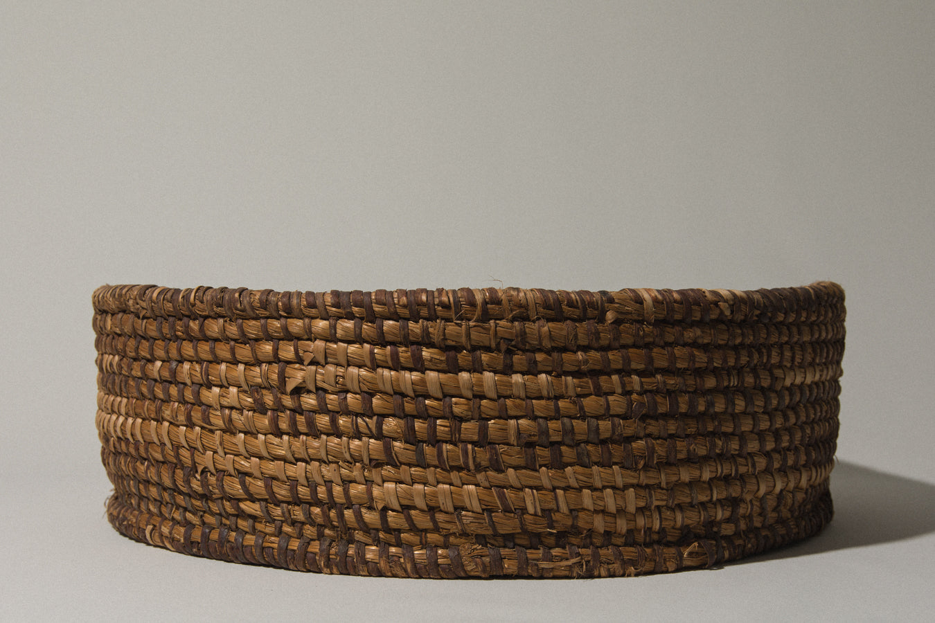 Large round flat BASKET with raised rim