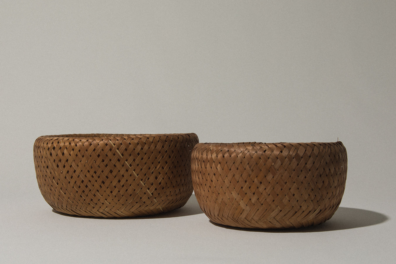 Set of two woven rush BASKETS