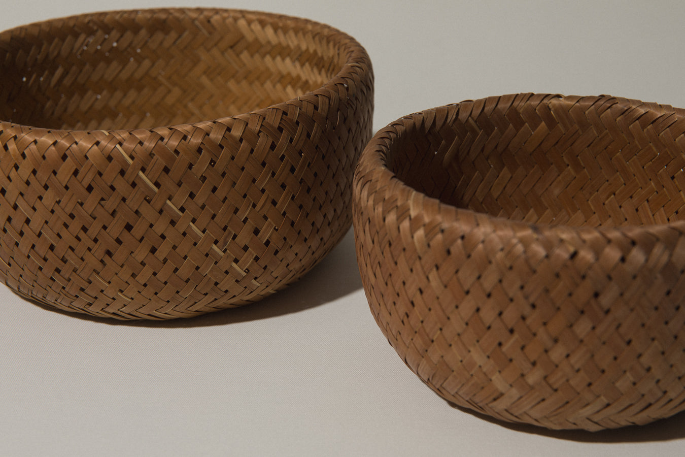 Set of two woven rush BASKETS