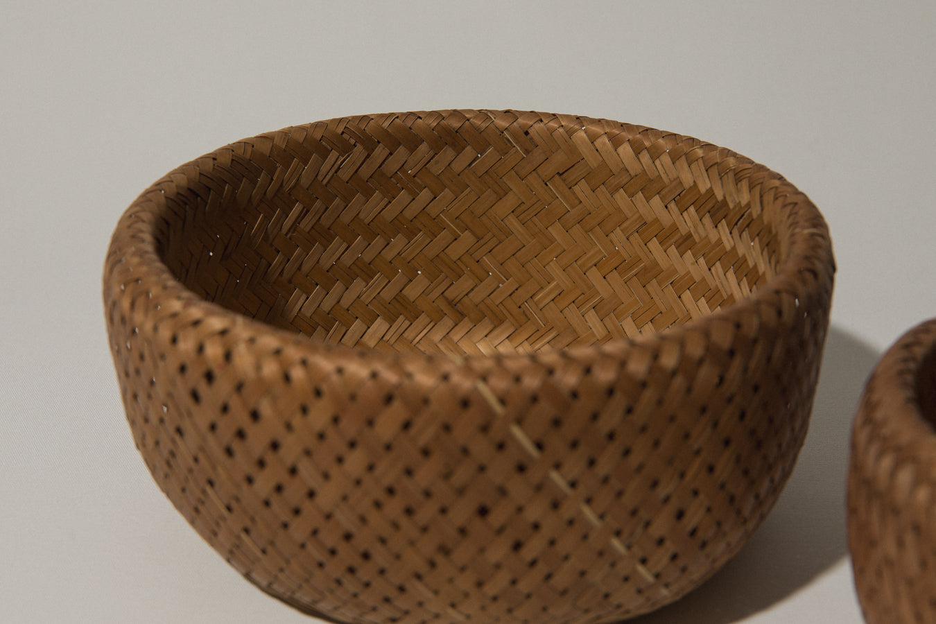 Set of two woven rush BASKETS