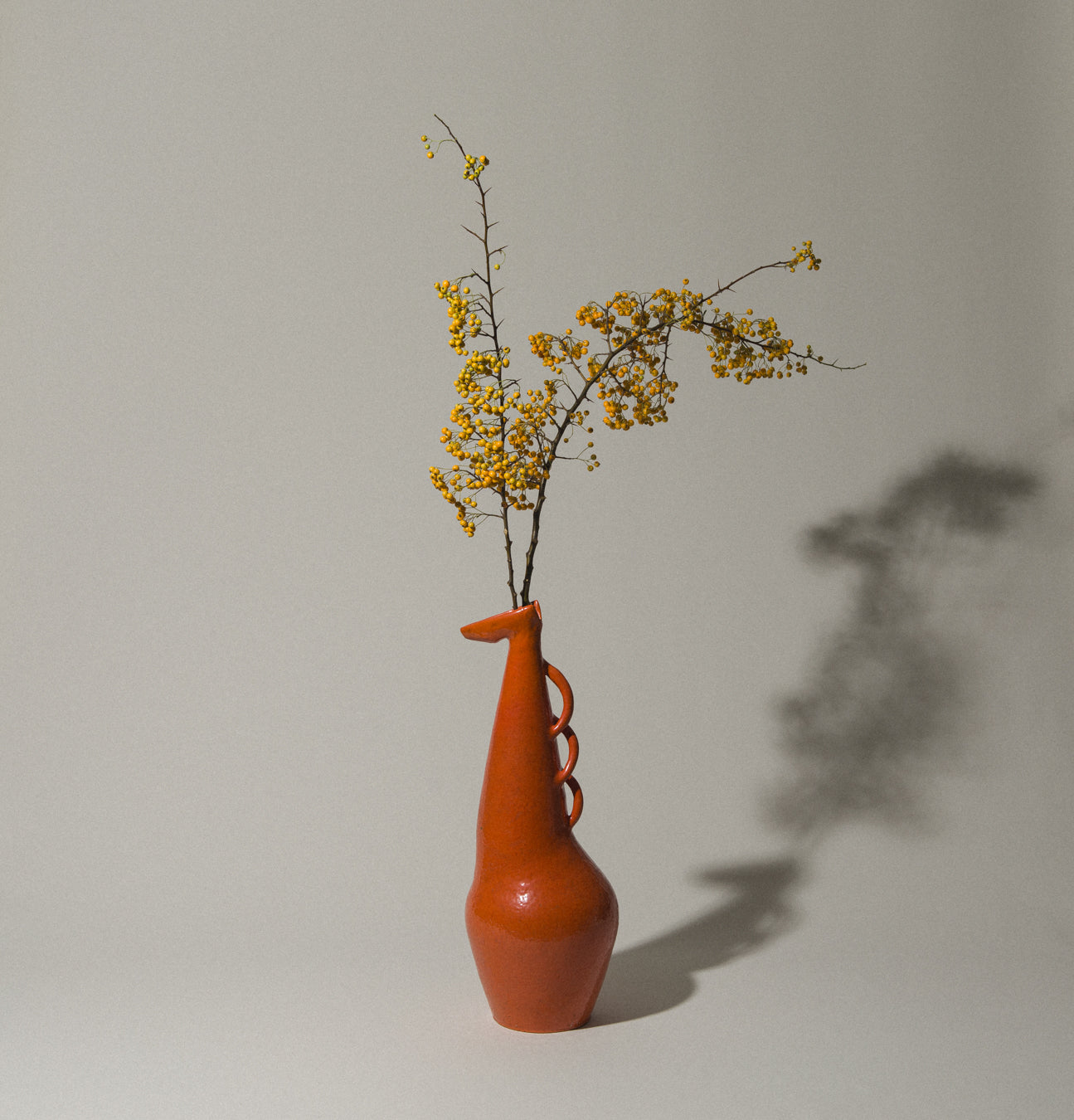 Orange giraffe-shaped VASE by István Gádor