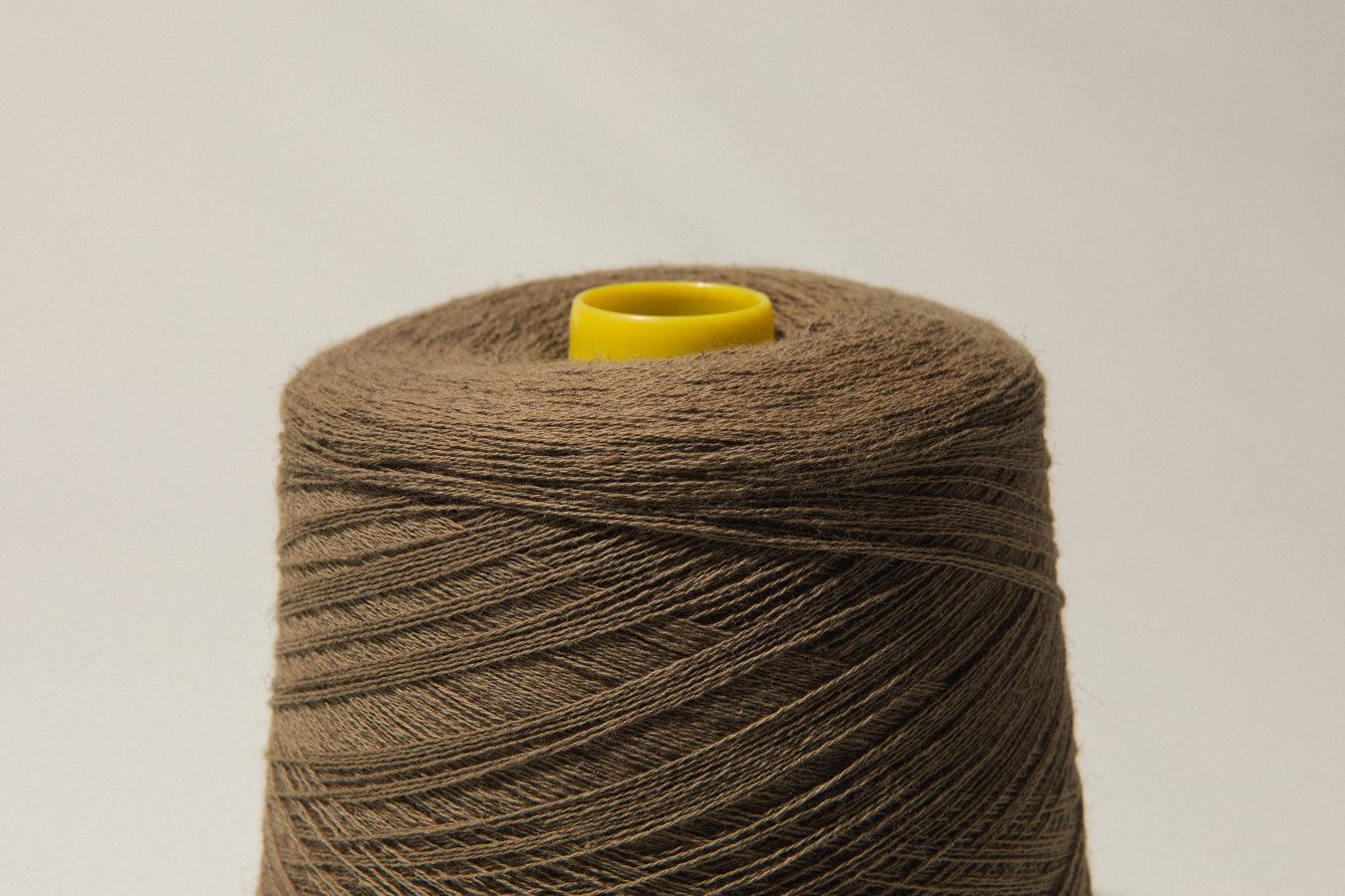 Dull brown vintage YARN on cone