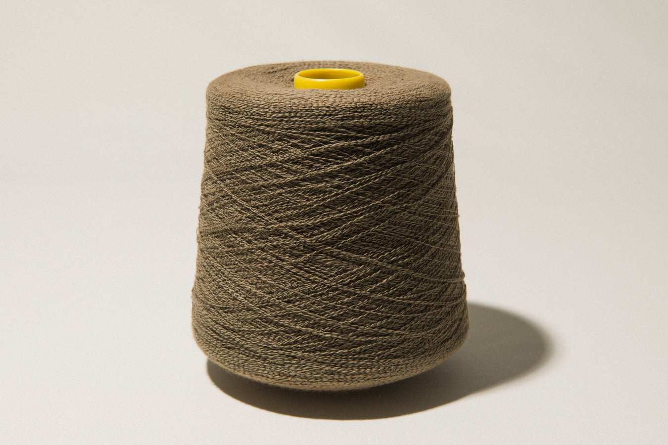 Dull brown vintage YARN on cone