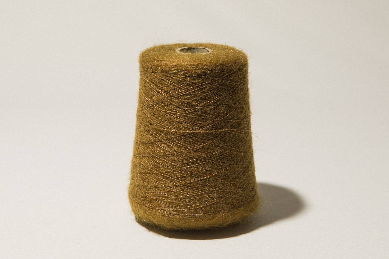 Ochre-brown vintage YARN on cone