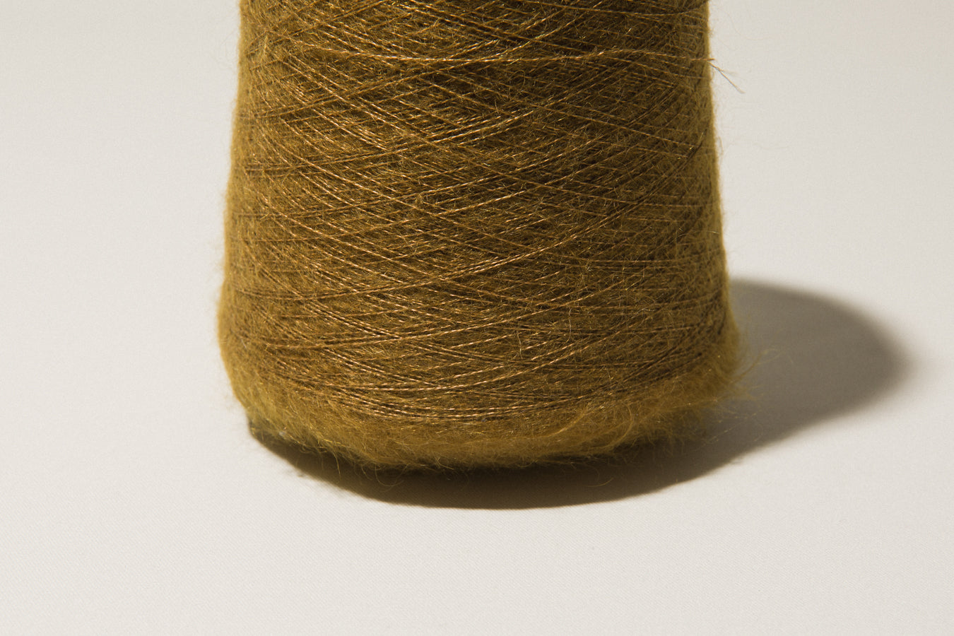 Ochre-brown vintage YARN on cone