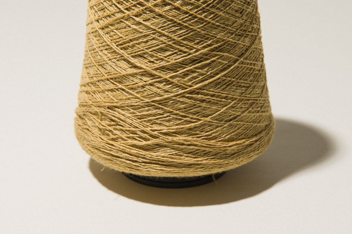 Light ochre vintage YARN on cone