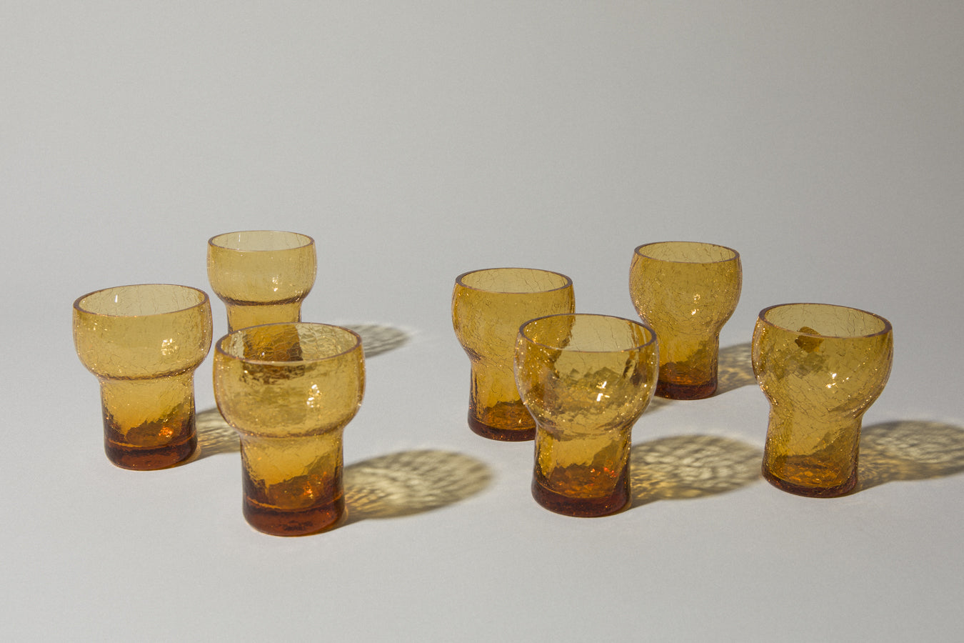 Set of seven crackled amber glass TUMBLERS