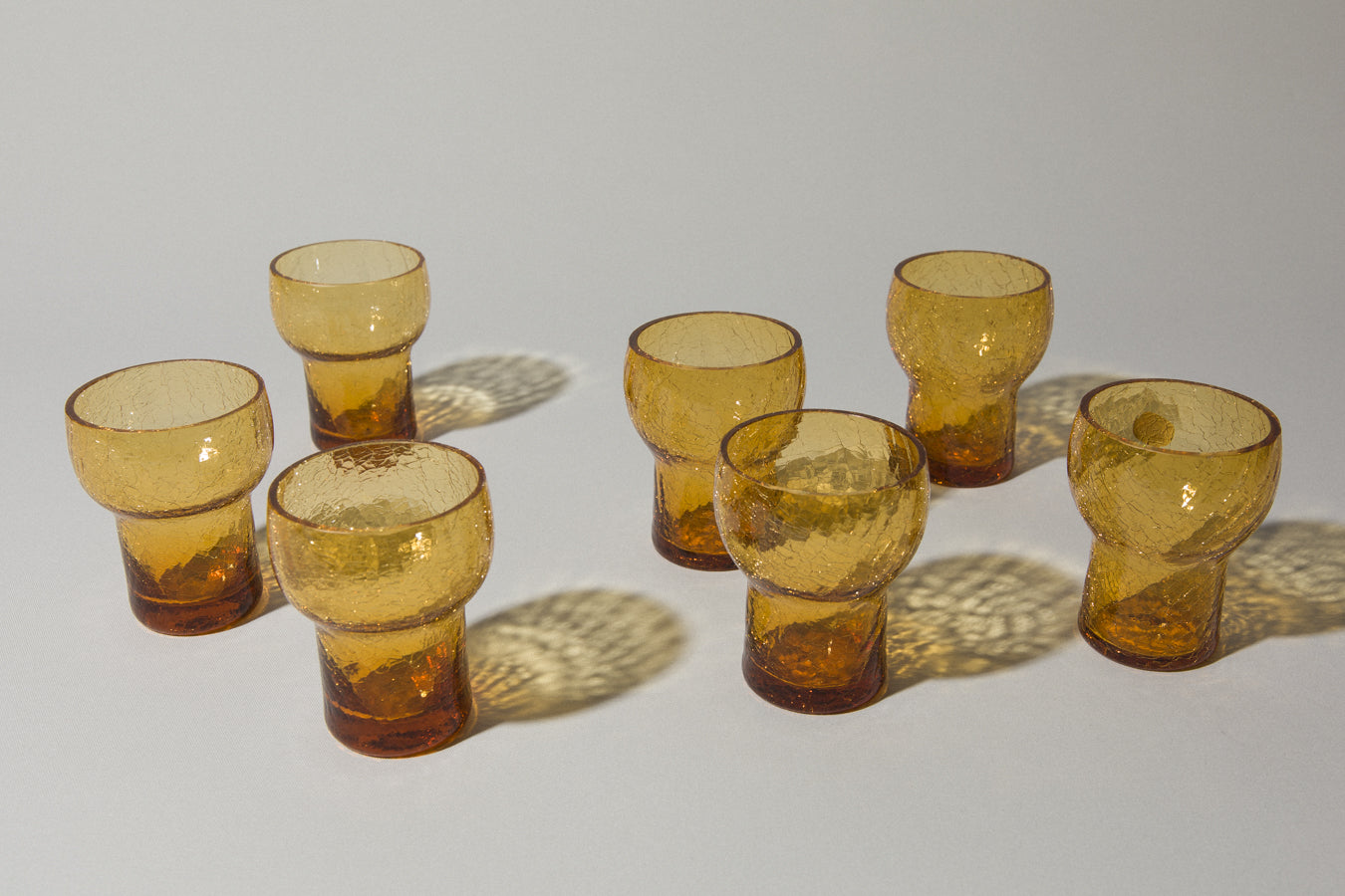 Set of seven crackled amber glass TUMBLERS