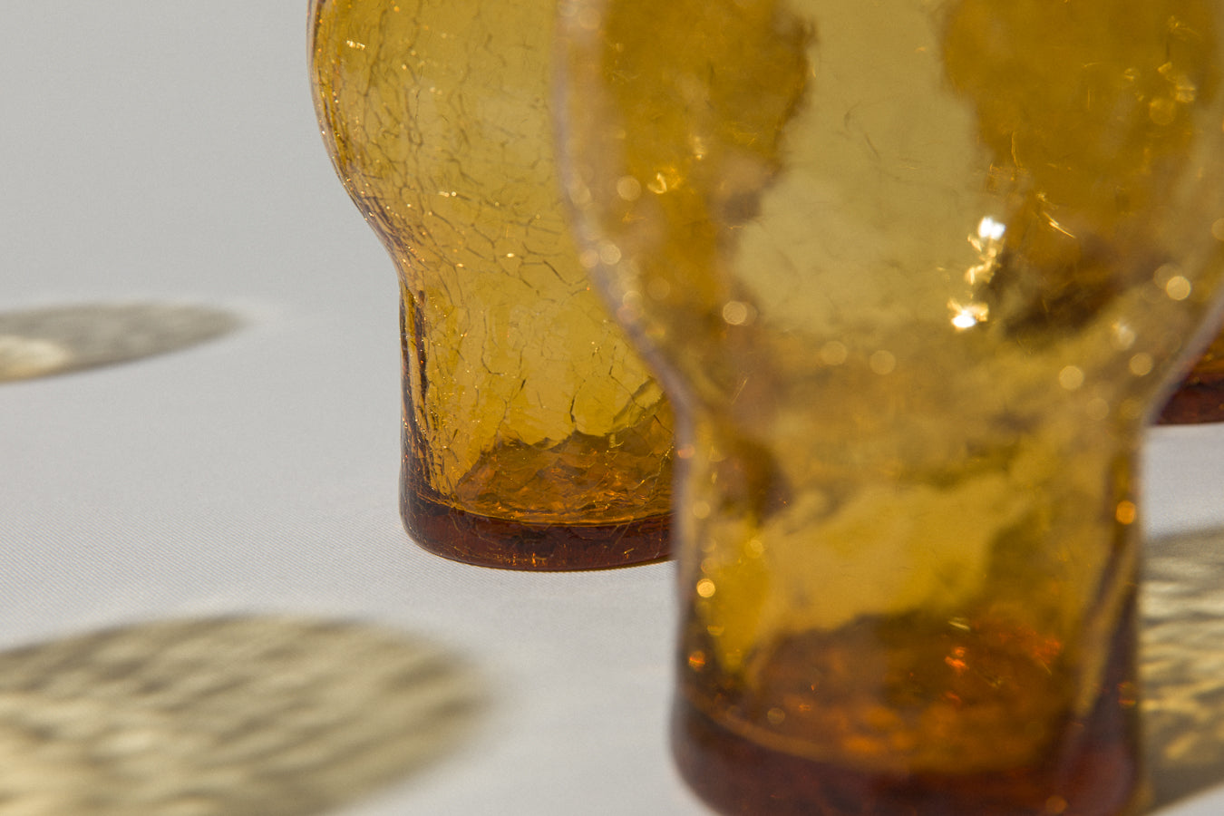 Set of seven crackled amber glass TUMBLERS