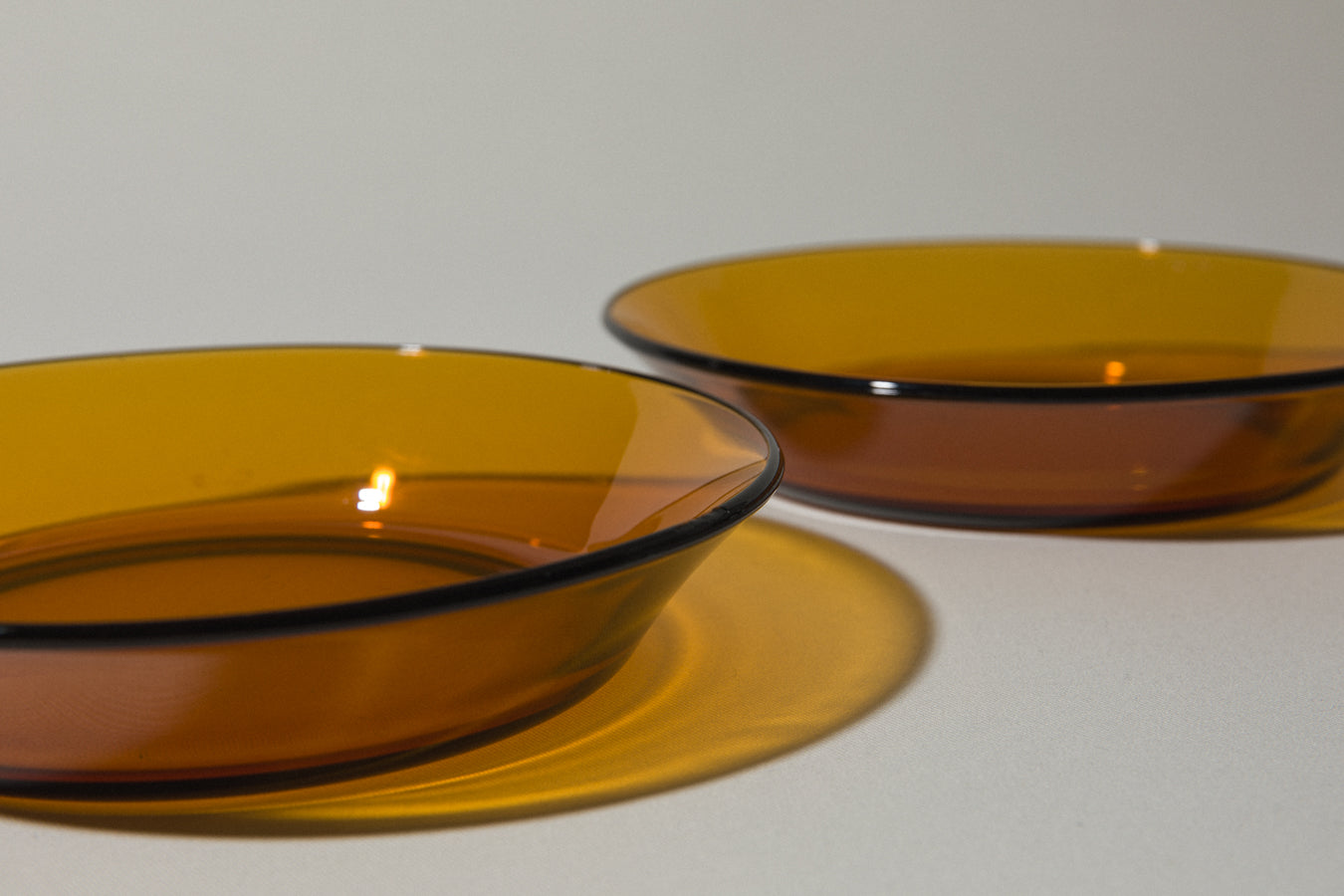 Set of three amber SOUP PLATES