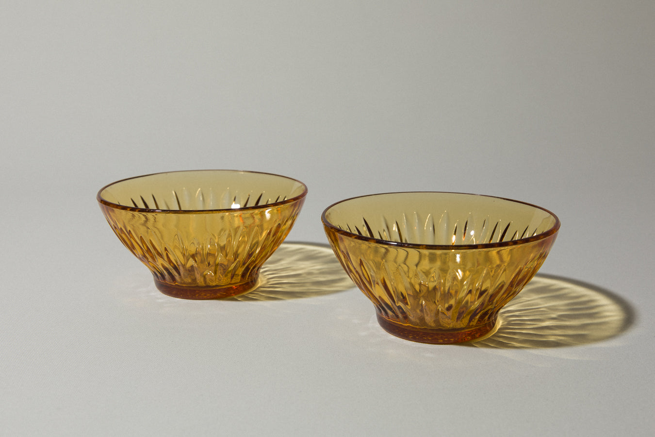 Set of two amber glass BOWLS small