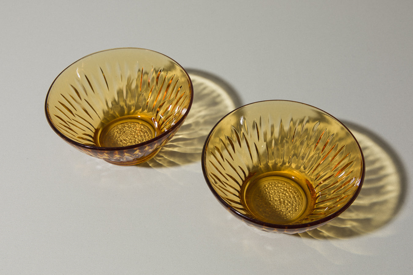 Set of two amber glass BOWLS small