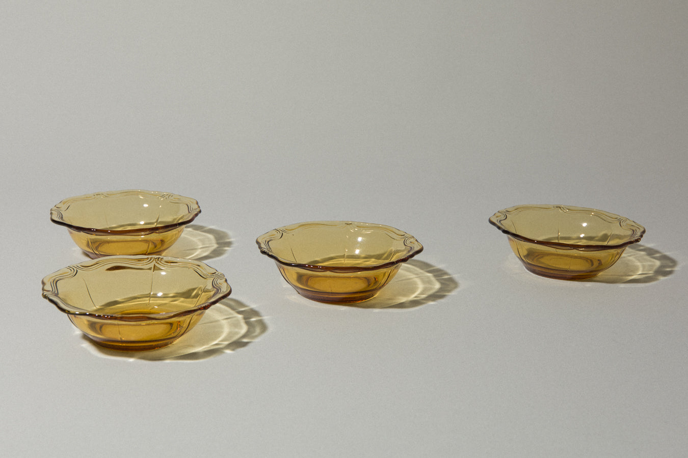 Set of four amber glass BOWLS small
