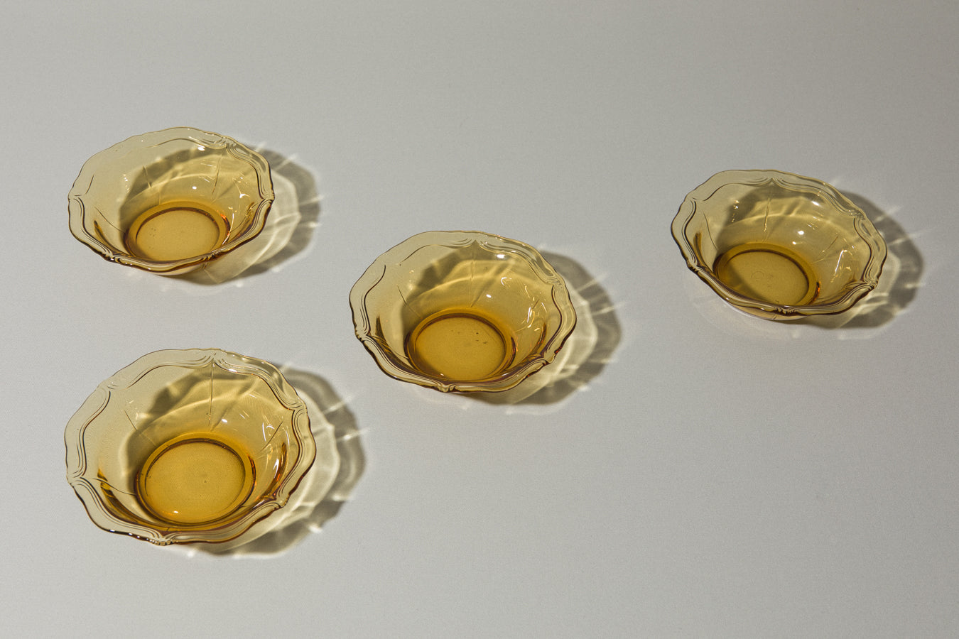 Set of four amber glass BOWLS small