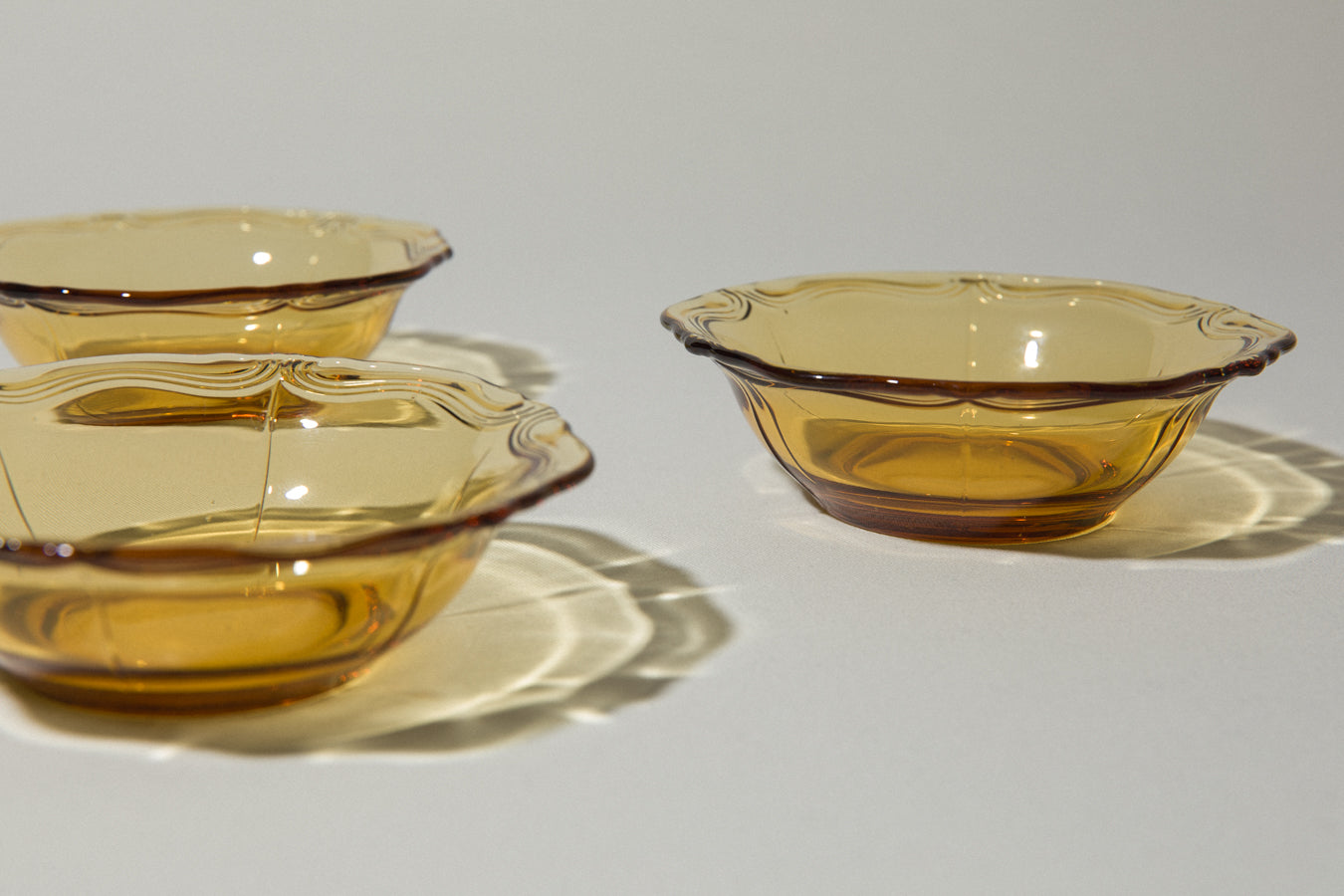 Set of four amber glass BOWLS small